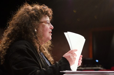 Playwright Sherry Kramer holding a script